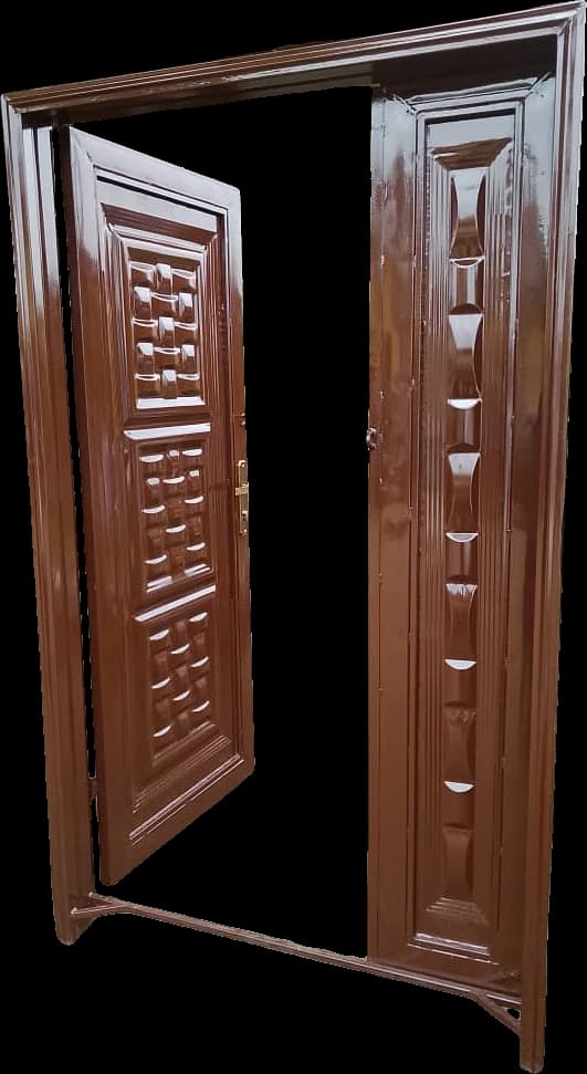 Open double steel safety door with embossed panels, finished in glossy brown at the Loyal Point workshop in Ketu